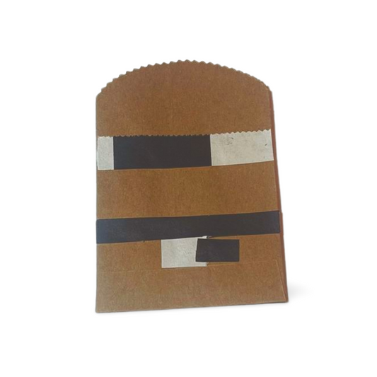 Black and white patchwork striped journal envelope, perfect for stylish note-taking.