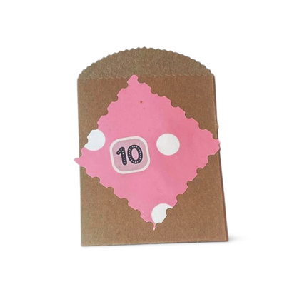 Polka dot pink junk journal envelope with #10 design, perfect for A7 cards.