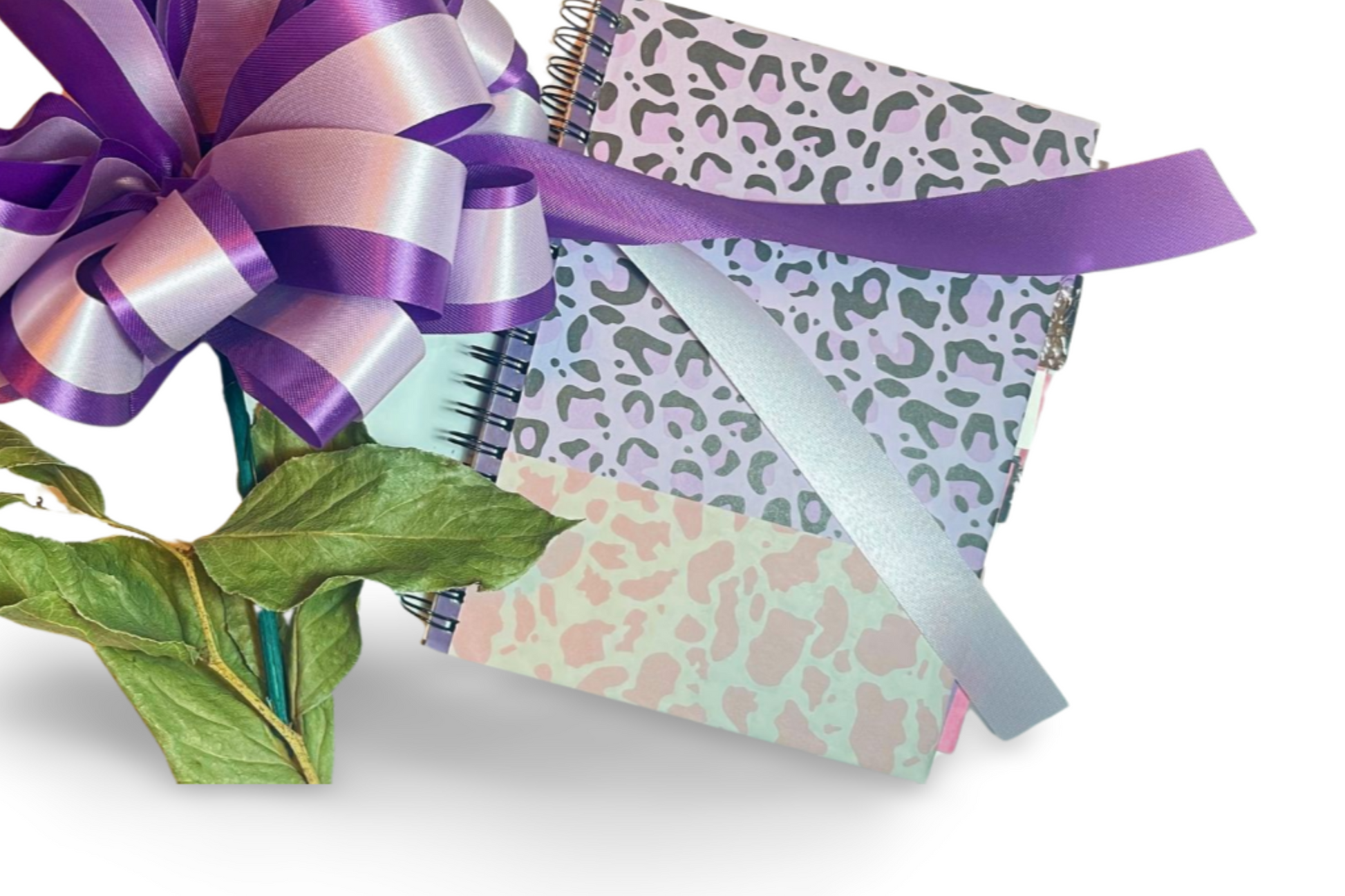 Say goodbye to bulky binders and hello to the Binder Notebook - the ultimate solution for staying organized and stylish. Order yours today and experience the convenibinderbinderPurple Animal Print Binding Notebook